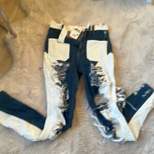 SUPER DISTRESSED DENIM PANTS